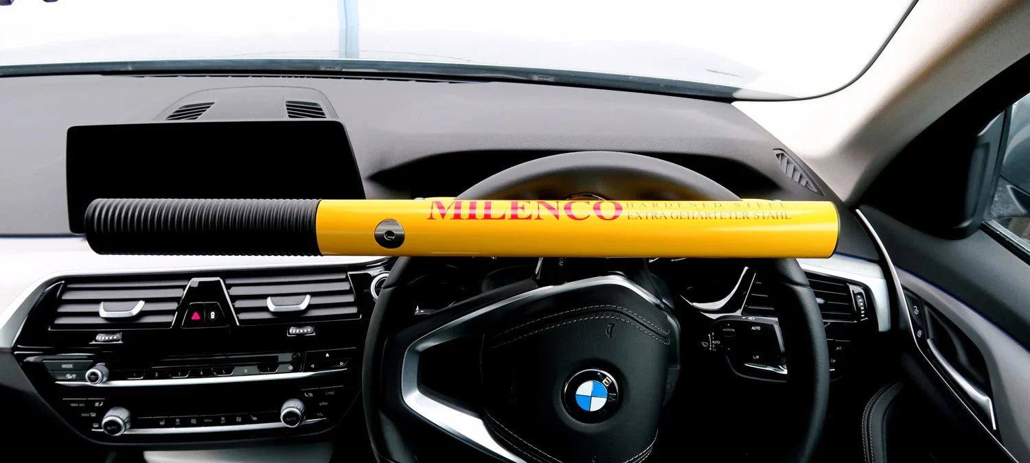 Milenco High-Security Steering Wheel Lock fitted inside a vehicle — superior visible theft deterrent – Enhance Your Caravan Comfort with Milenco High-Security Steering Wheel Lock+ Yellow - Ultimate Vehicle Security and Theft Deterrent