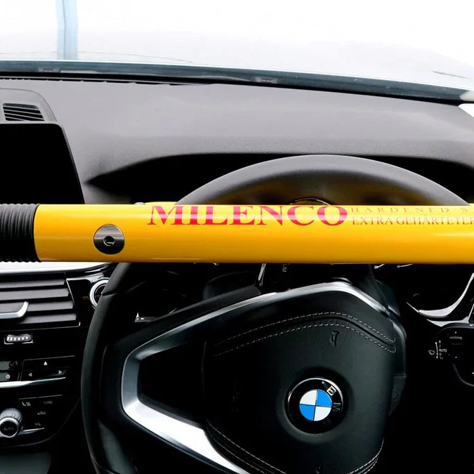 Milenco High-Security Steering Wheel Lock fitted inside a vehicle — superior visible theft deterrent – Enhance Your Caravan Comfort with Milenco High-Security Steering Wheel Lock+ Yellow - Ultimate Vehicle Security and Theft Deterrent