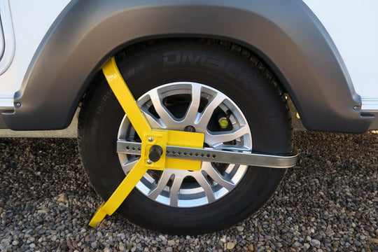 Milenco Lightweight Wheelclamp – Caravan 13"–15" Wheels – Insurance Approved – High-Visibility Lock - Milenco security products offering high-level protection for caravans and motorhomes, including wheel locks, hitchlocks and door locks - My Milenco